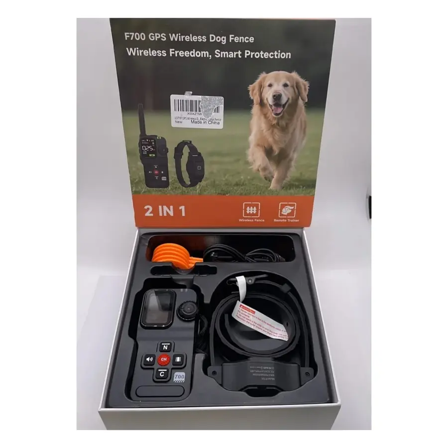 F700 box opened with handheld GPS remote, receiver collar, contact points and USB cable